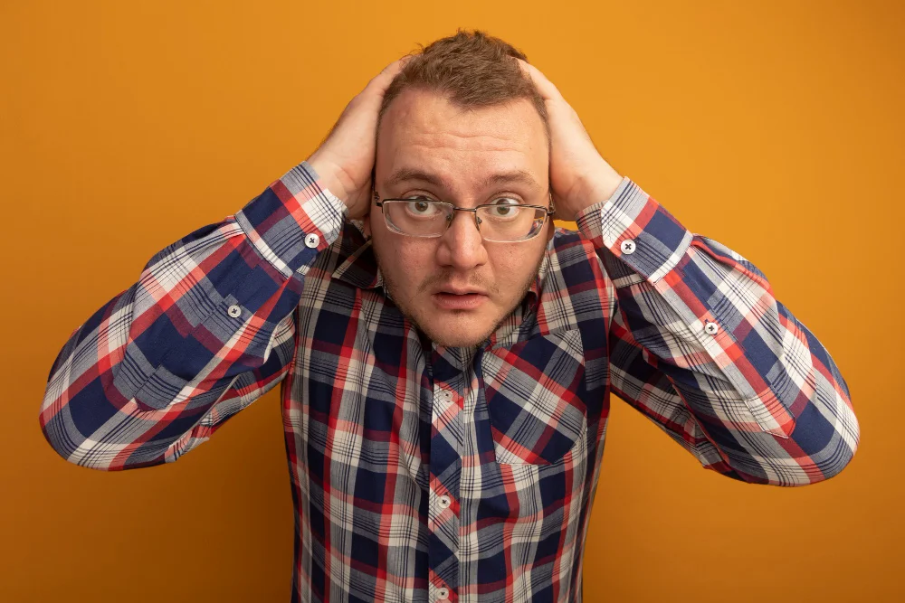 Worried IT Customer Worried IT Customer - A Man with his hands on his head as if he is worried about something.